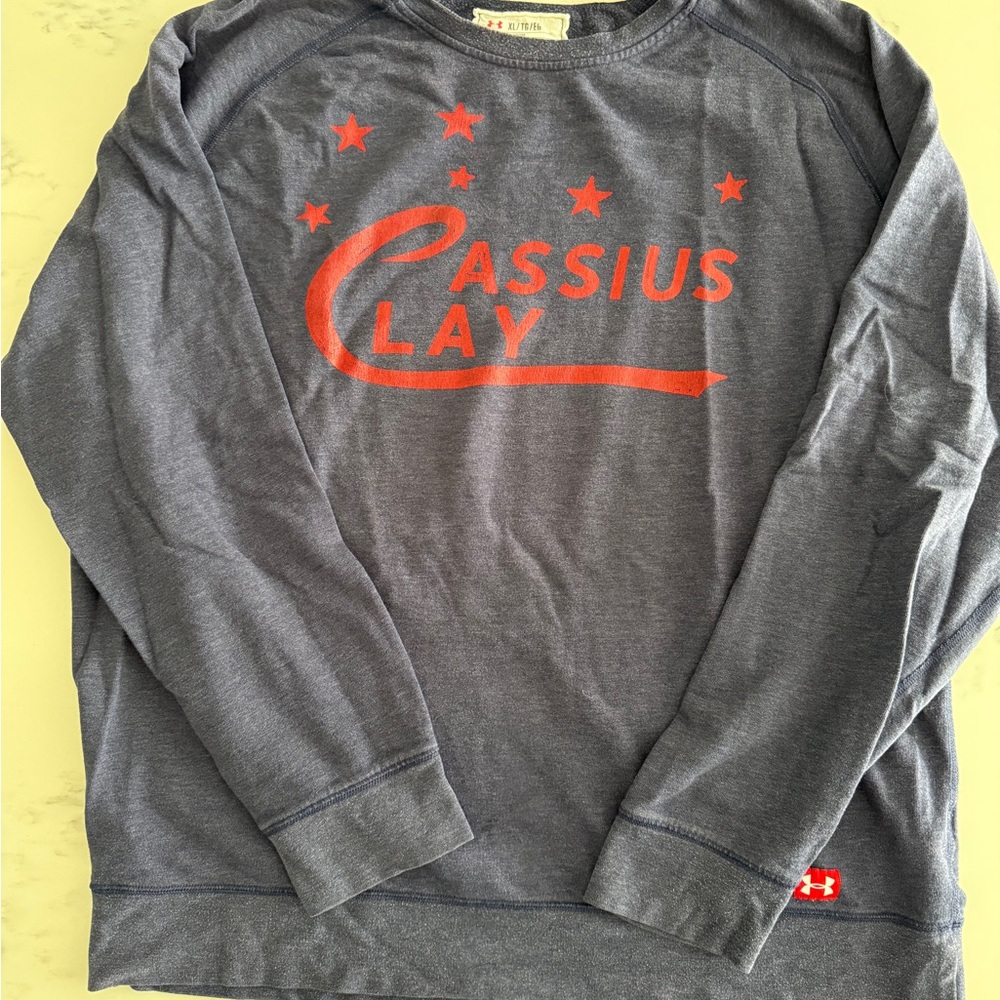Under Armour Roots Of Fight Cassius Clay Crewneck Sweatshirt.